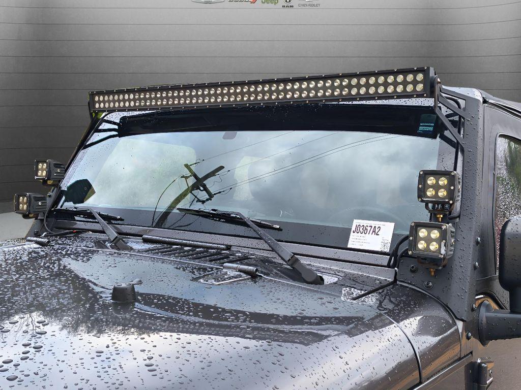 used 2016 Jeep Wrangler Unlimited car, priced at $22,843