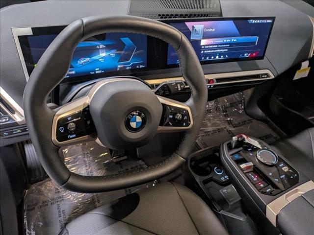 new 2026 BMW iX car, priced at $83,795