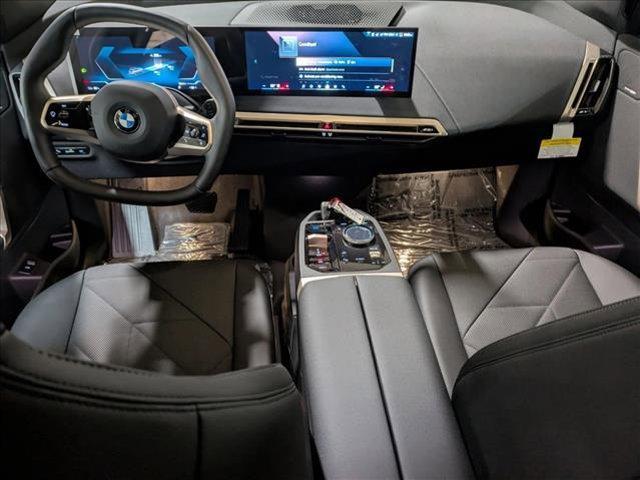 new 2026 BMW iX car, priced at $83,795