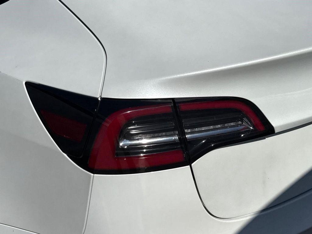 used 2023 Tesla Model 3 car, priced at $30,686