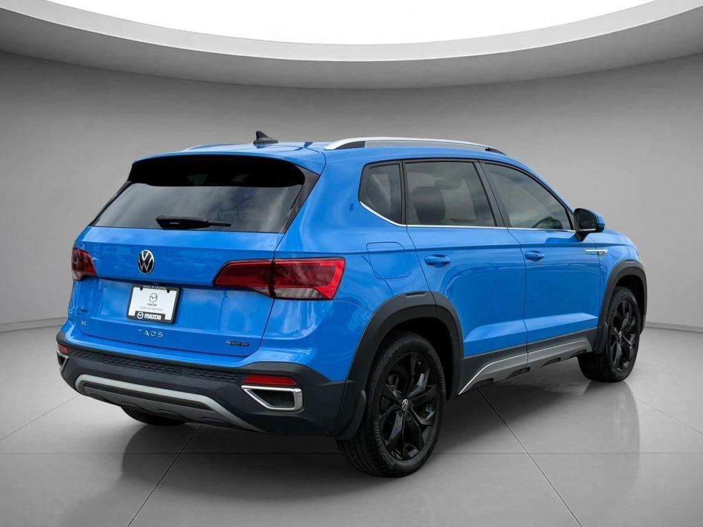 used 2023 Volkswagen Taos car, priced at $24,495