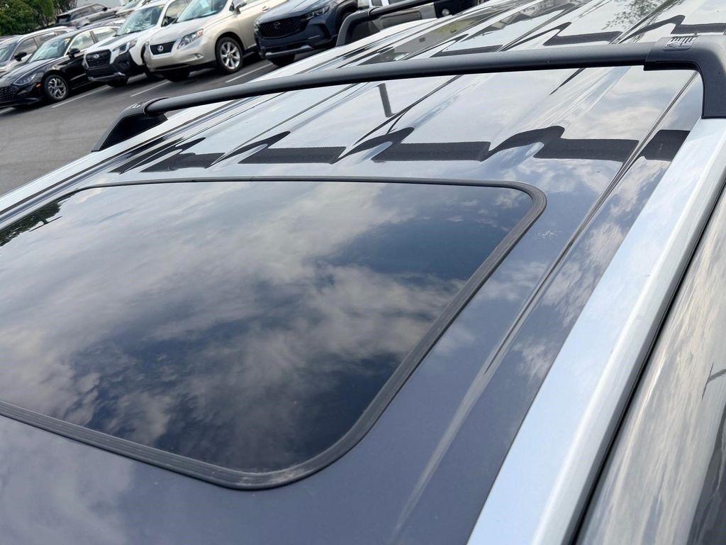 used 2024 Toyota Highlander Hybrid car, priced at $43,904