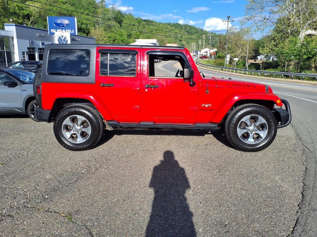 used 2018 Jeep Wrangler JK Unlimited car, priced at $20,697