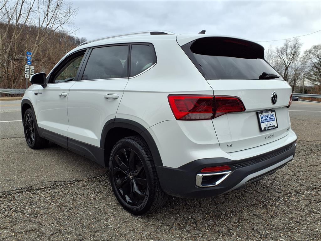 used 2024 Volkswagen Taos car, priced at $23,161