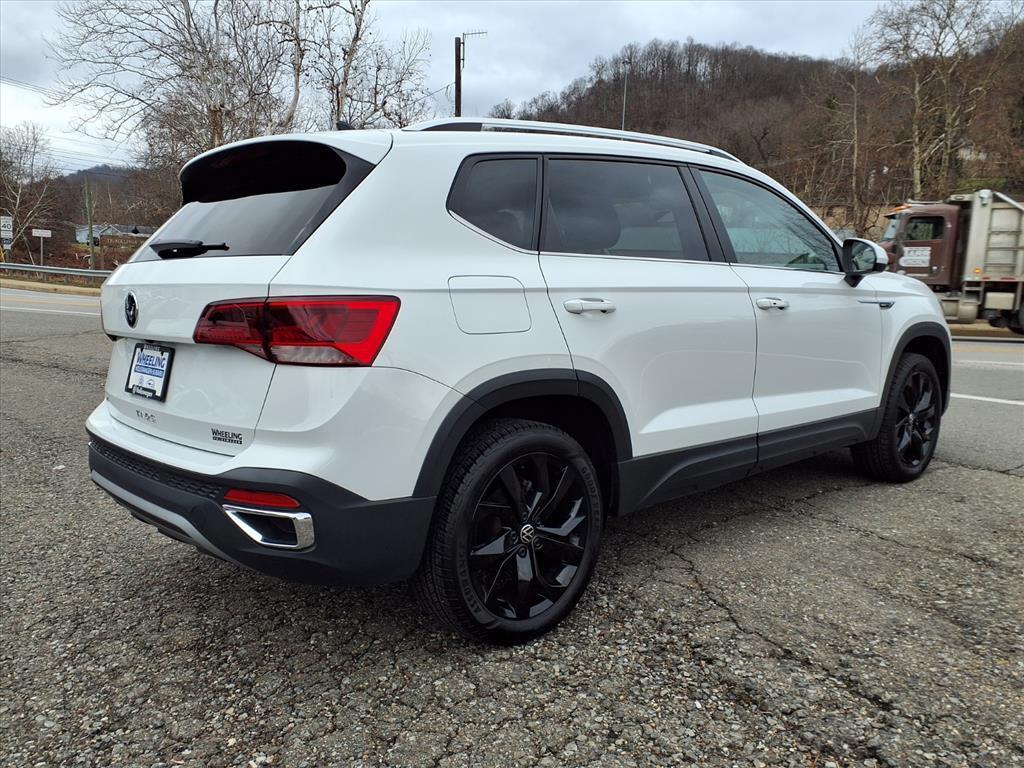 used 2024 Volkswagen Taos car, priced at $23,161