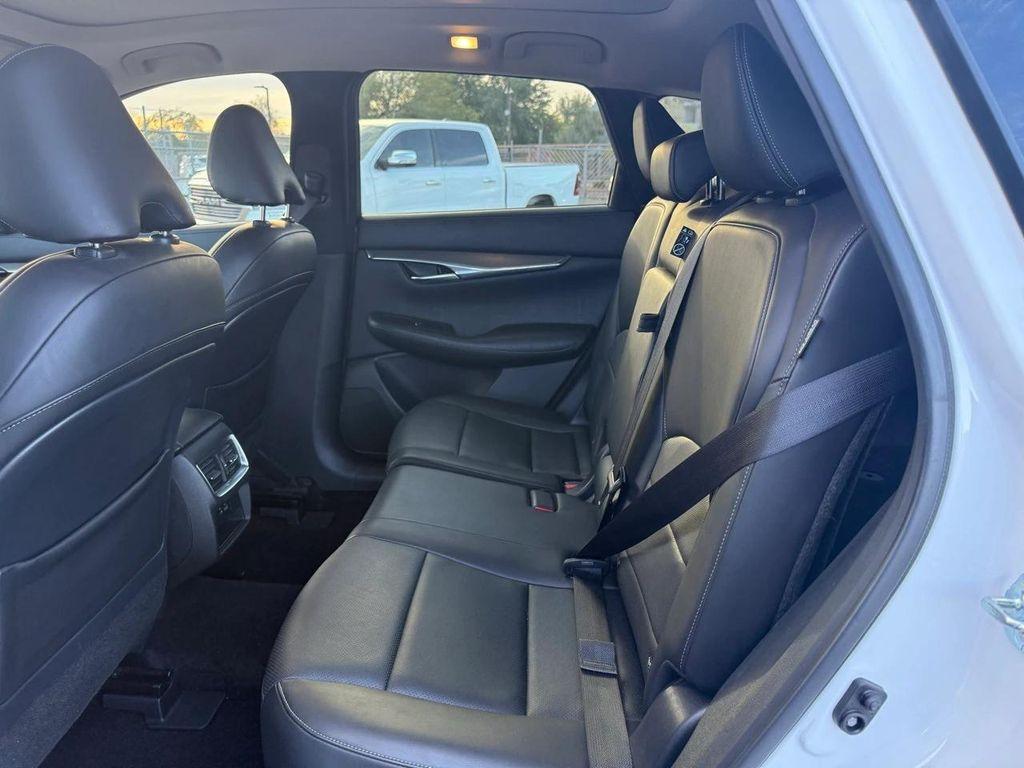 used 2023 INFINITI QX50 car, priced at $28,599