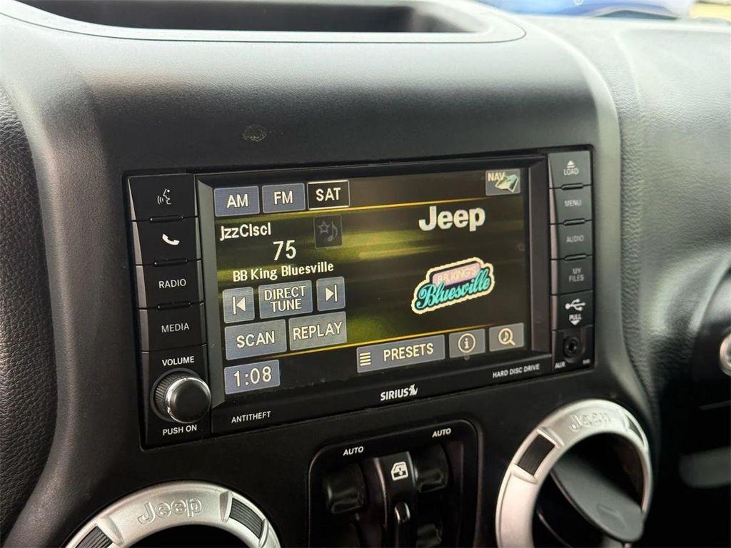 used 2016 Jeep Wrangler Unlimited car, priced at $24,195