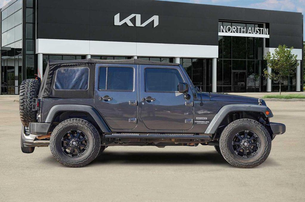 used 2014 Jeep Wrangler Unlimited car, priced at $13,698