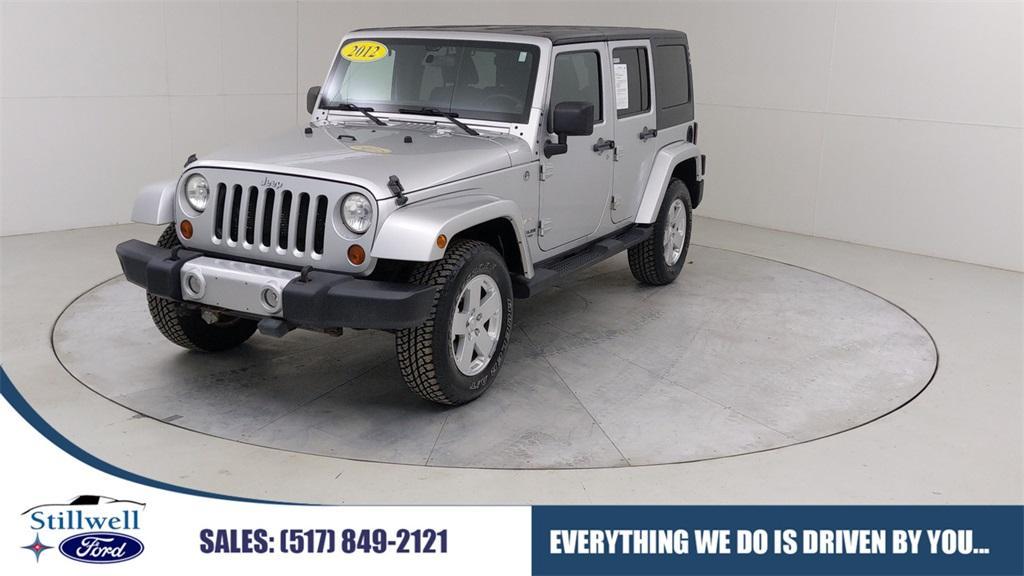 used 2012 Jeep Wrangler Unlimited car, priced at $14,889