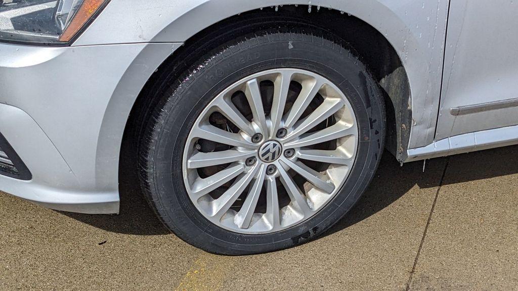 used 2016 Volkswagen Passat car, priced at $6,941