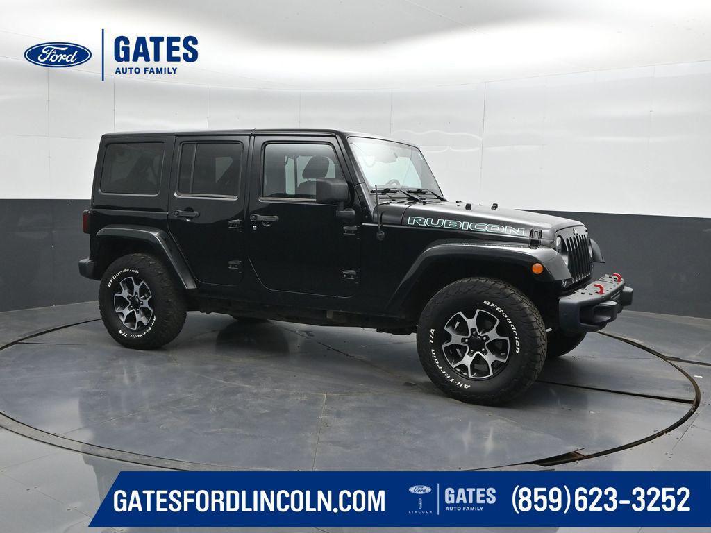 used 2013 Jeep Wrangler Unlimited car, priced at $17,693
