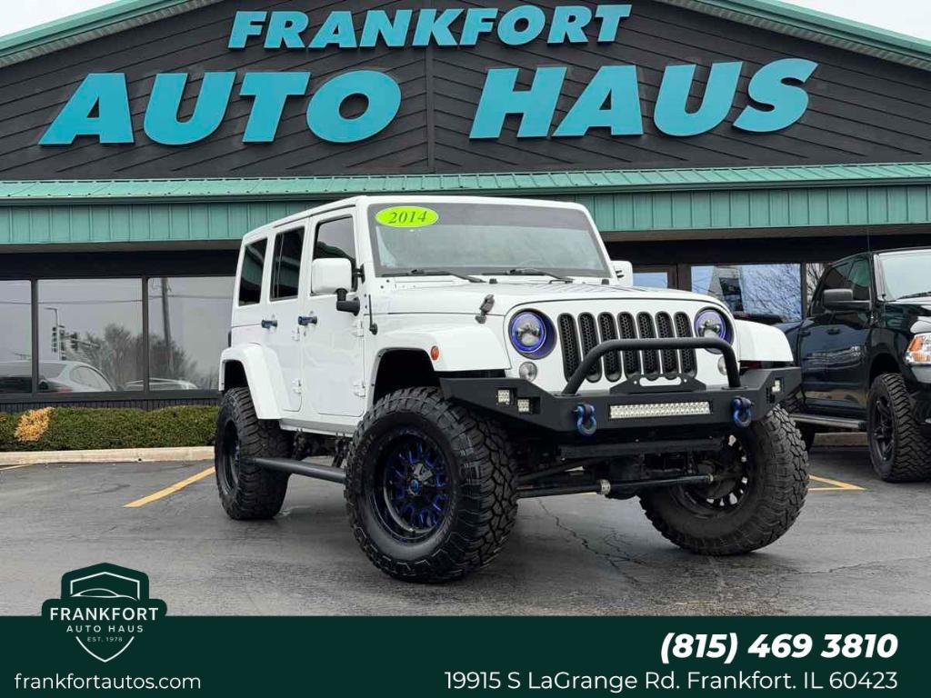 used 2014 Jeep Wrangler Unlimited car, priced at $17,499