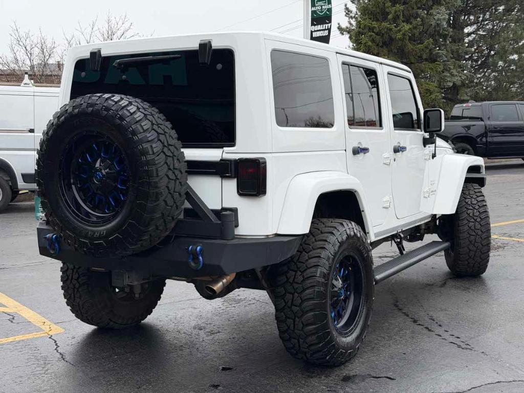 used 2014 Jeep Wrangler Unlimited car, priced at $17,499