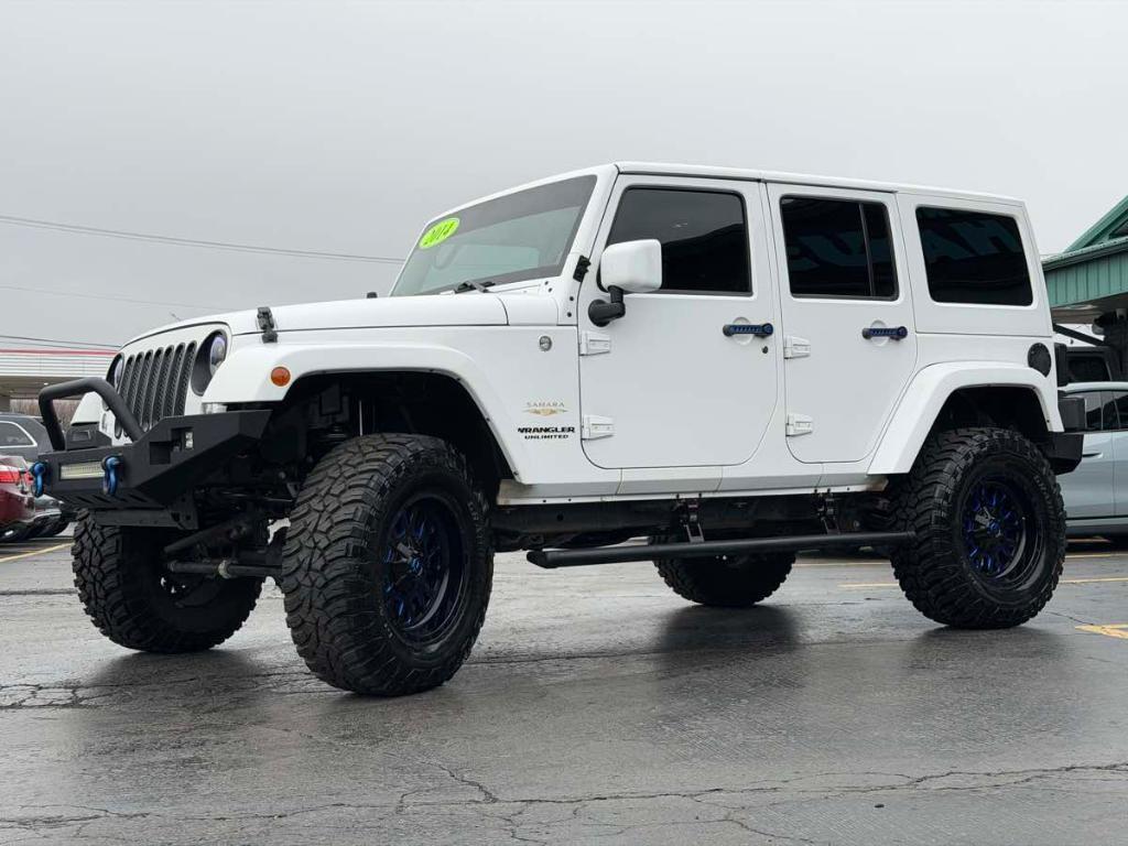 used 2014 Jeep Wrangler Unlimited car, priced at $17,499