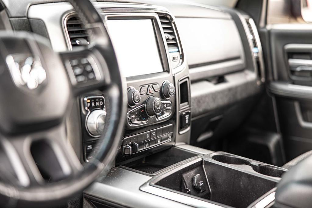 used 2015 Ram 1500 car, priced at $24,409