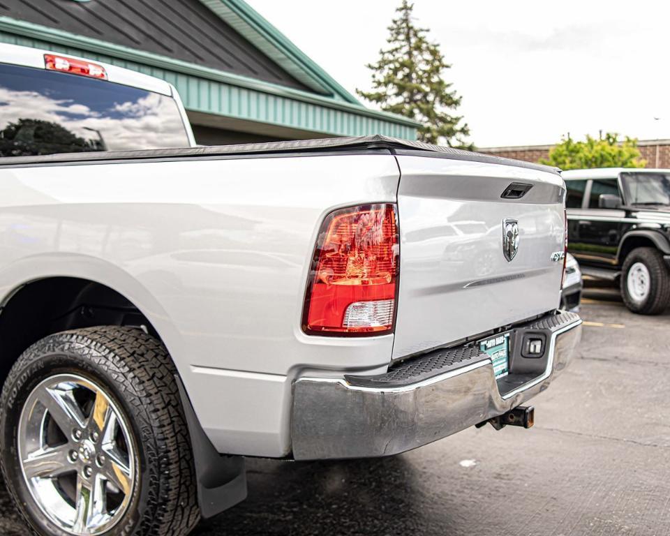 used 2018 Ram 1500 car, priced at $18,709