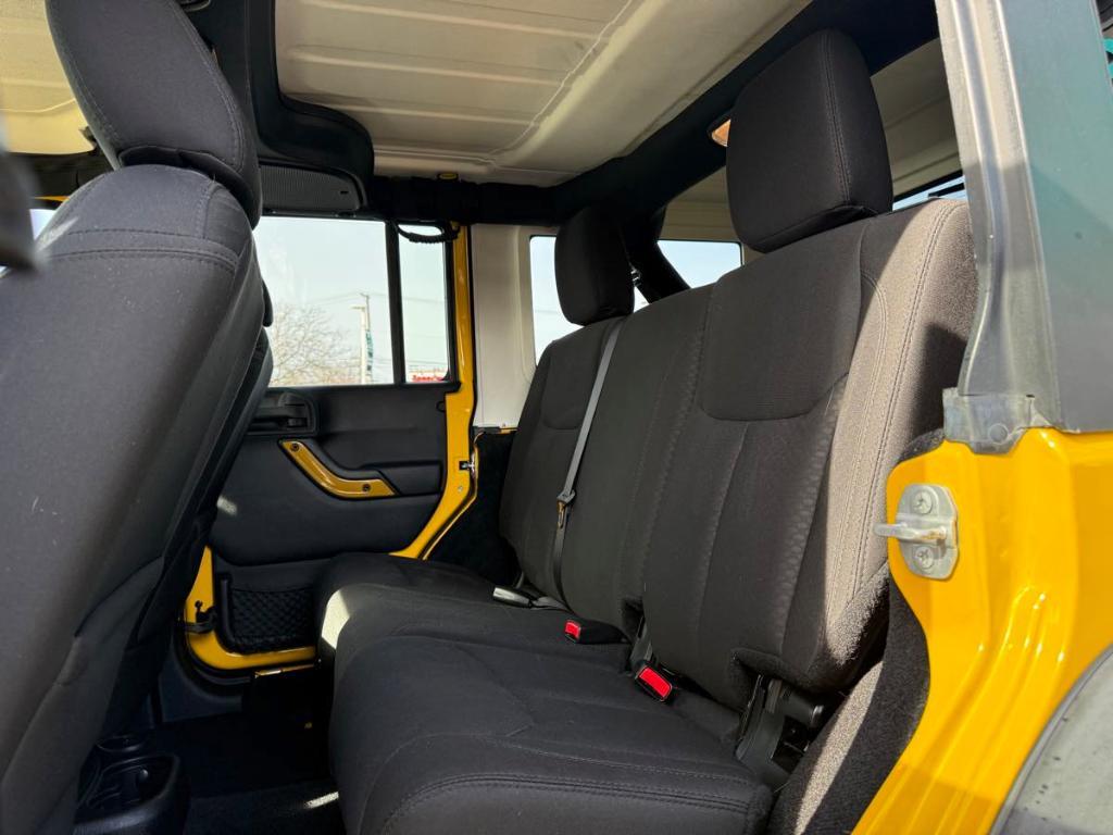 used 2015 Jeep Wrangler Unlimited car, priced at $19,493