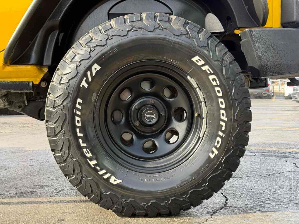 used 2015 Jeep Wrangler Unlimited car, priced at $19,493