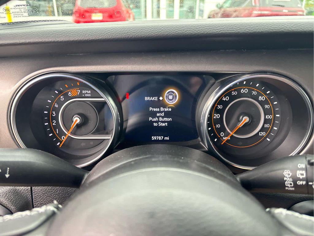 used 2023 Jeep Wrangler car, priced at $32,686