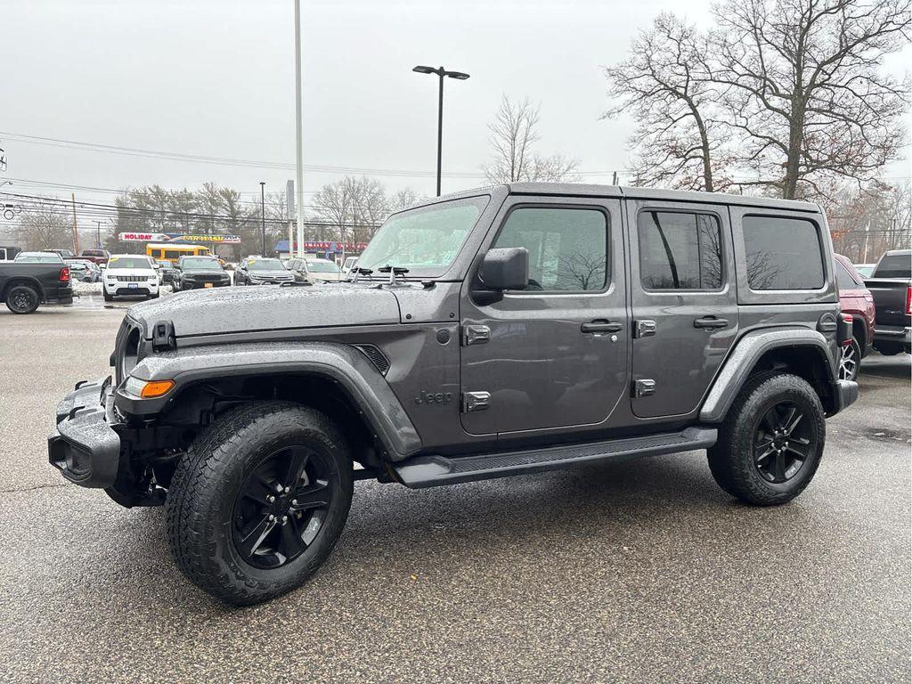 used 2021 Jeep Wrangler Unlimited car, priced at $36,176