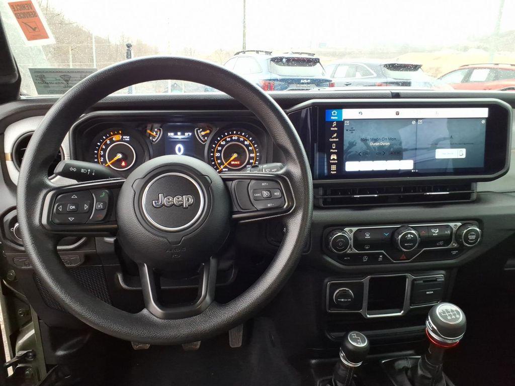 used 2024 Jeep Wrangler car, priced at $29,500