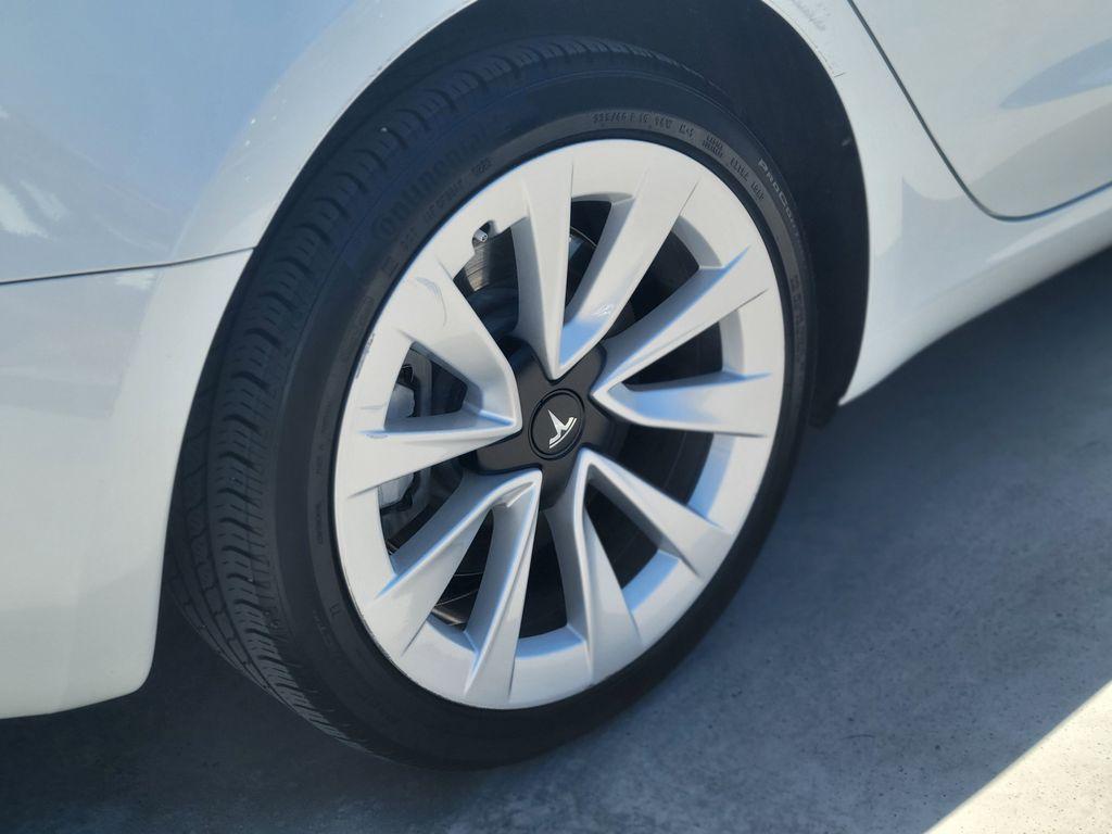 used 2023 Tesla Model 3 car, priced at $27,884