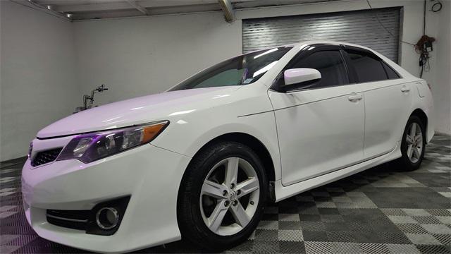 used 2013 Toyota Camry car, priced at $12,800