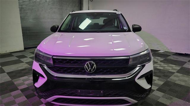 used 2024 Volkswagen Taos car, priced at $21,995