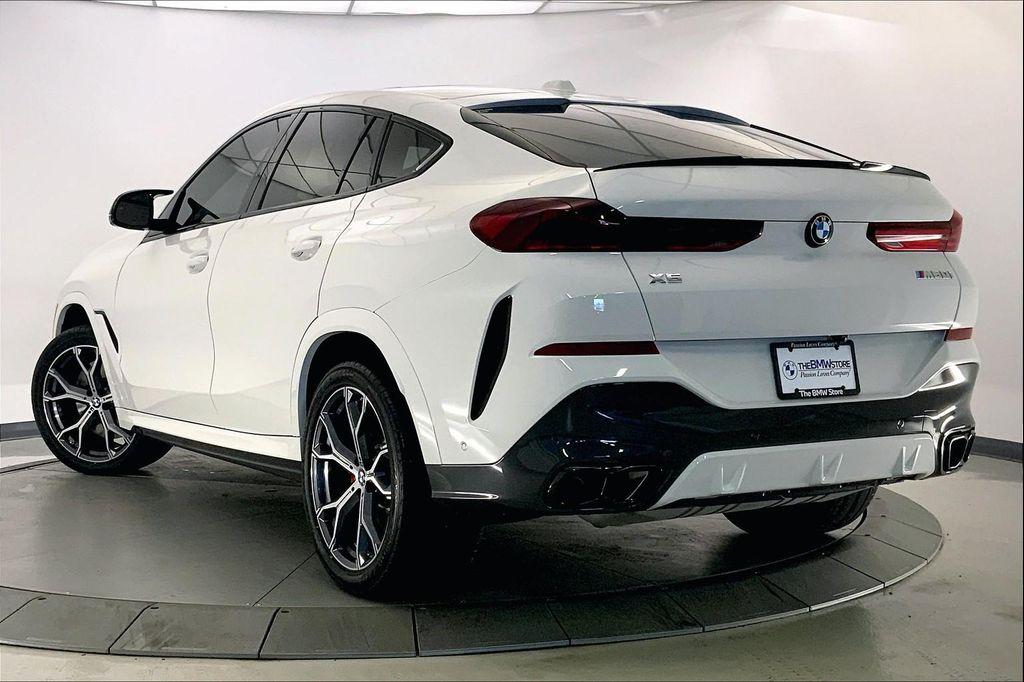used 2025 BMW X6 car, priced at $83,490