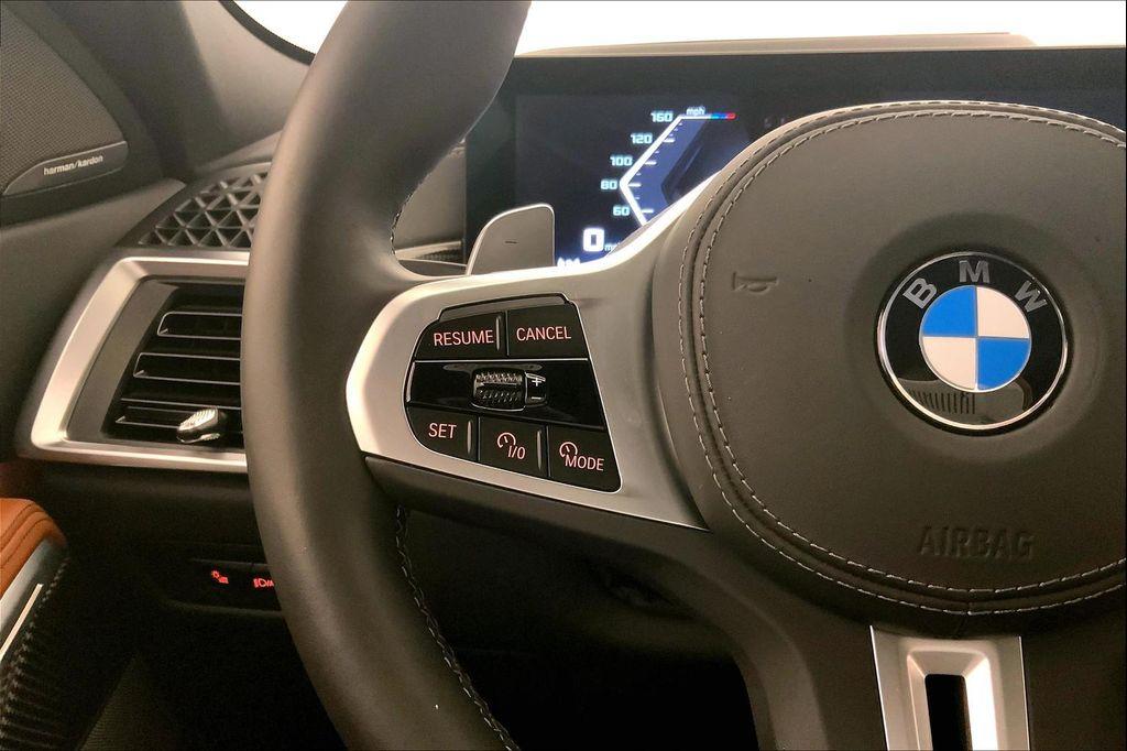 used 2025 BMW X6 car, priced at $83,490