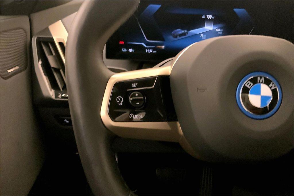 used 2024 BMW iX car, priced at $54,995
