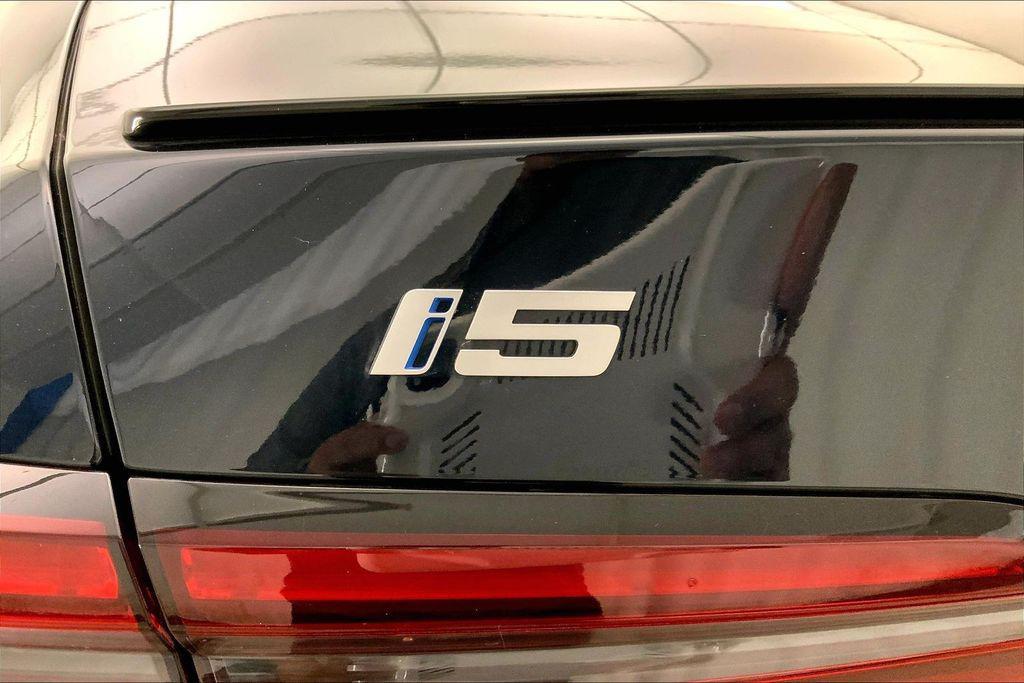 used 2024 BMW i5 car, priced at $69,393