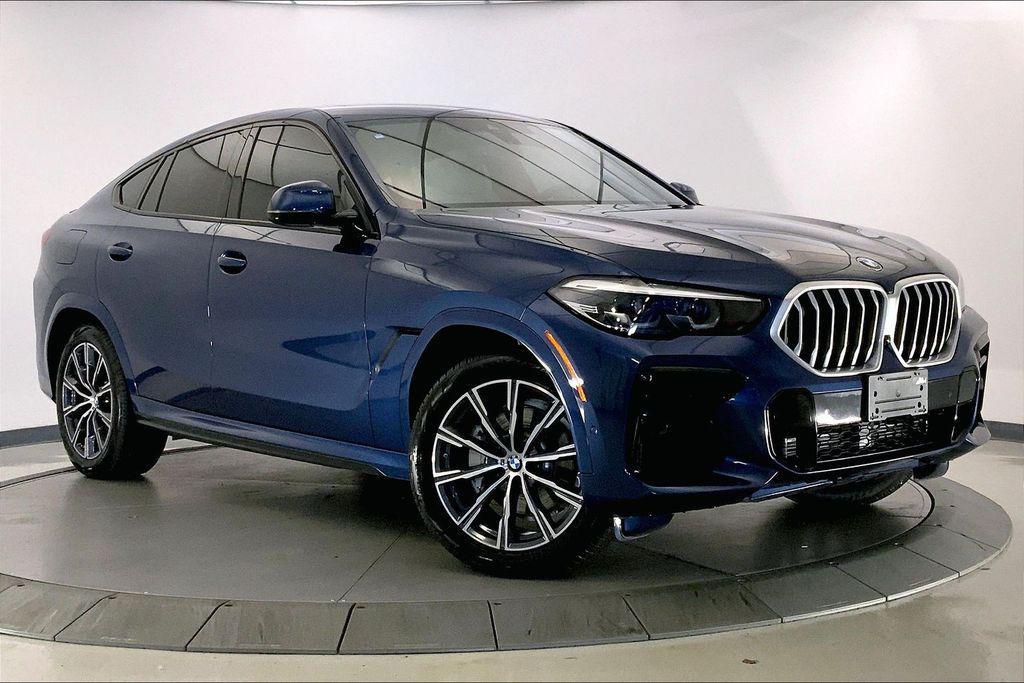 used 2023 BMW X6 car, priced at $65,393