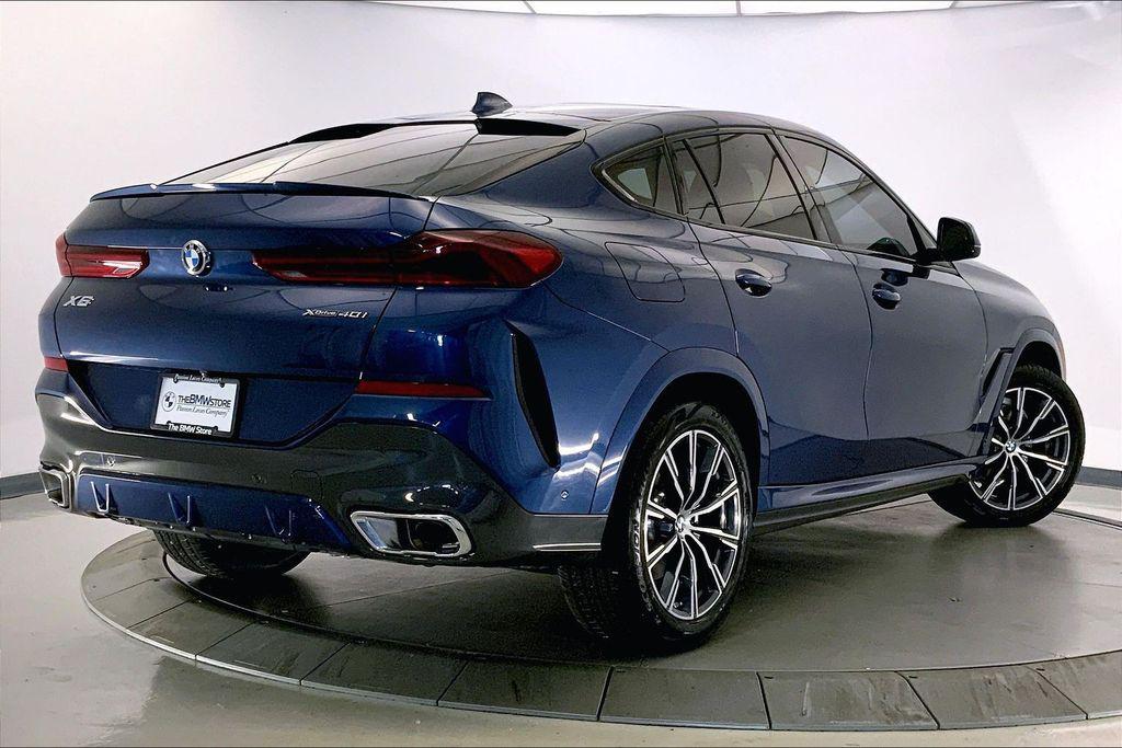used 2023 BMW X6 car, priced at $65,393