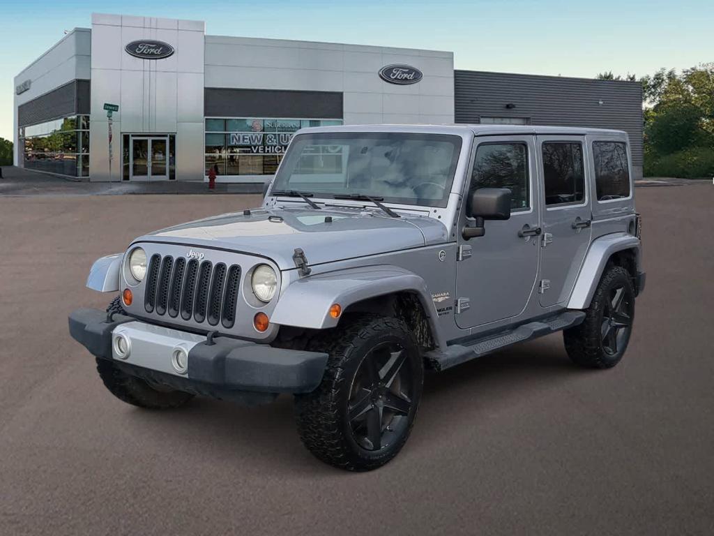 used 2013 Jeep Wrangler Unlimited car, priced at $13,489