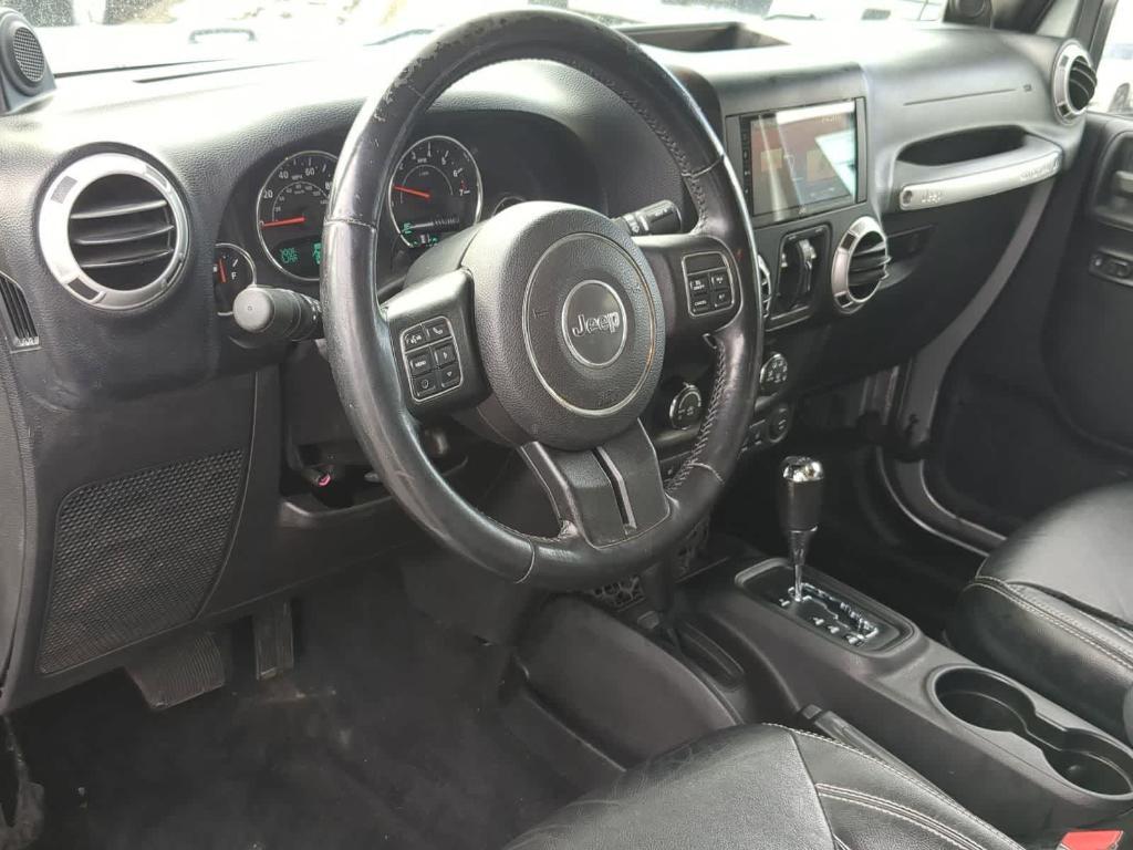 used 2013 Jeep Wrangler Unlimited car, priced at $13,489