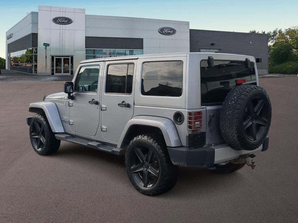used 2013 Jeep Wrangler Unlimited car, priced at $13,489