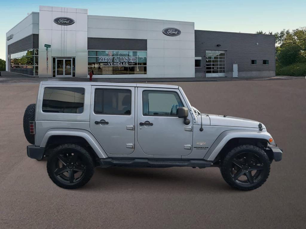 used 2013 Jeep Wrangler Unlimited car, priced at $13,489