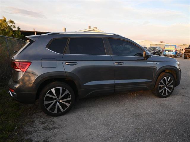 used 2023 Volkswagen Taos car, priced at $17,770