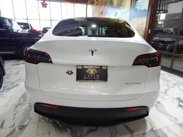 used 2023 Tesla Model Y car, priced at $27,985