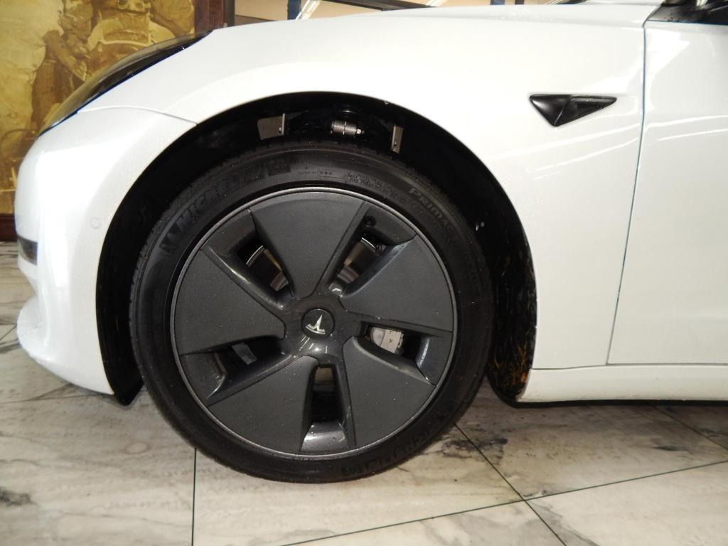 used 2023 Tesla Model 3 car, priced at $22,395