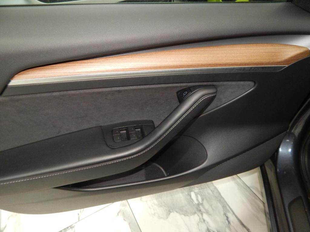 used 2023 Tesla Model 3 car, priced at $27,995