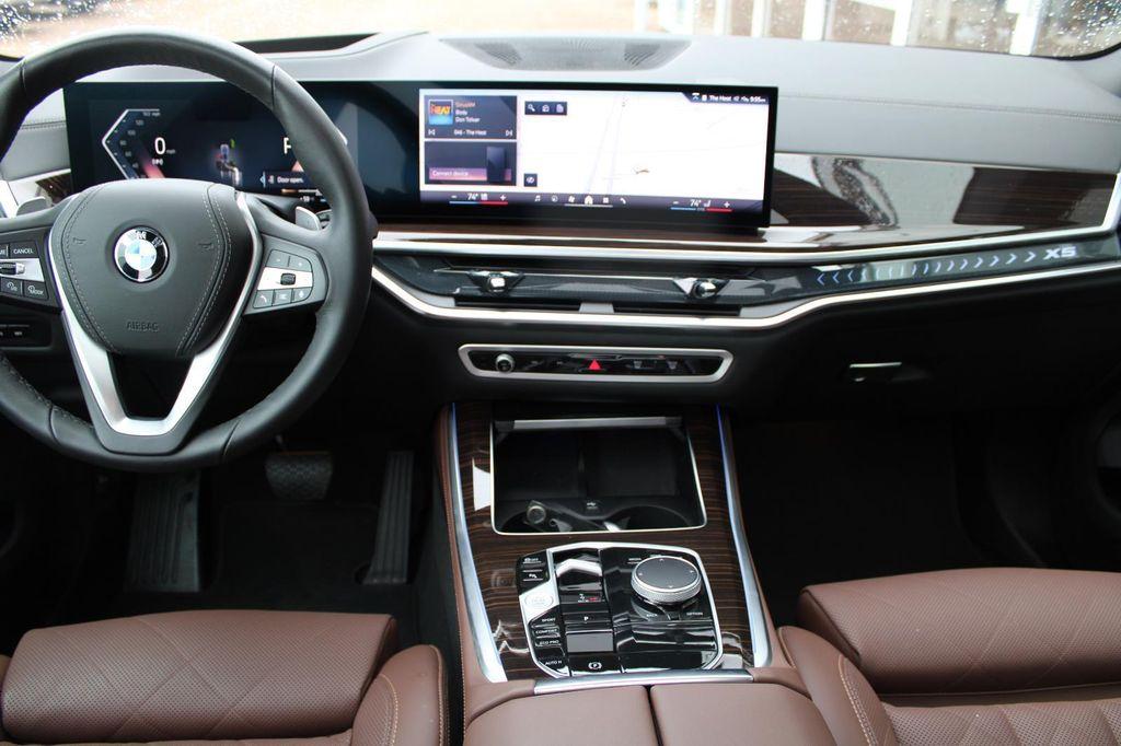 used 2026 BMW X5 car, priced at $62,423