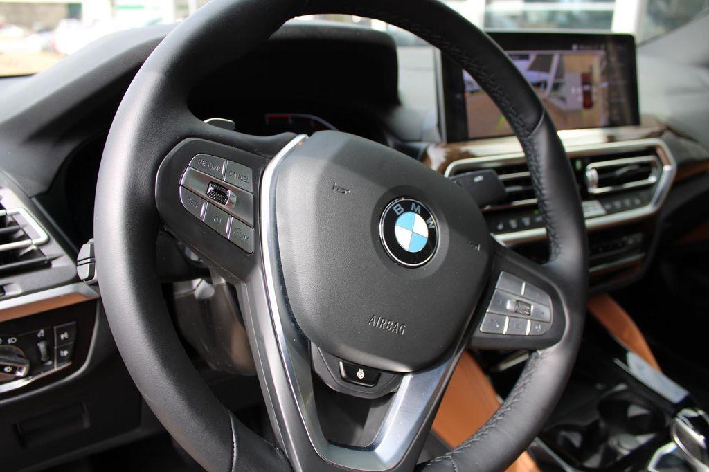 used 2025 BMW X4 car, priced at $49,196