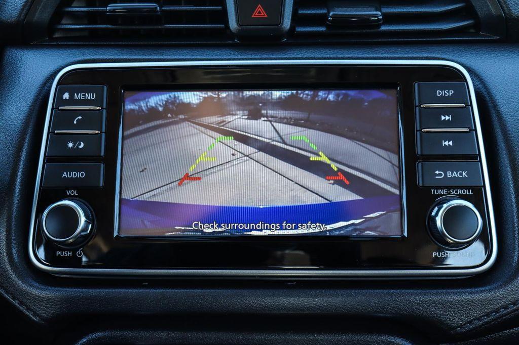 used 2024 Nissan Versa car, priced at $15,000