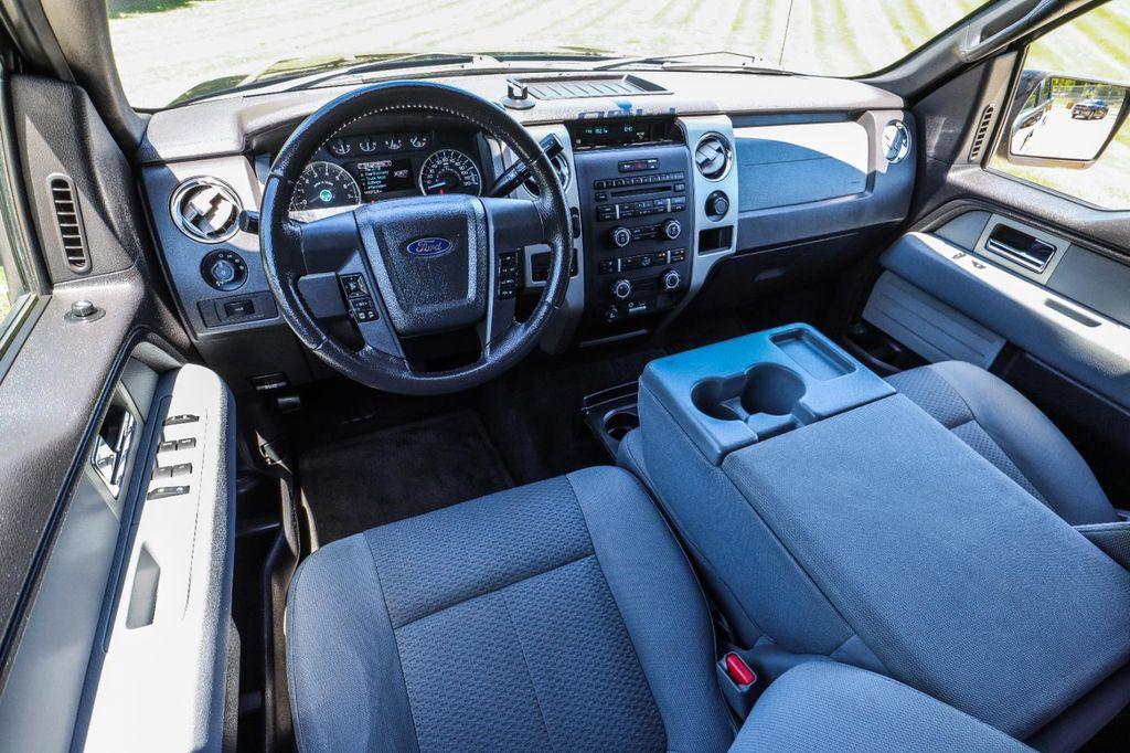 used 2011 Ford F-150 car, priced at $15,000