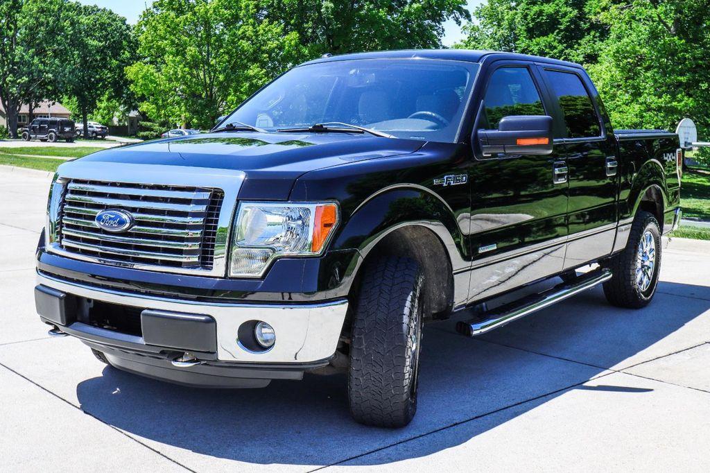 used 2011 Ford F-150 car, priced at $15,000