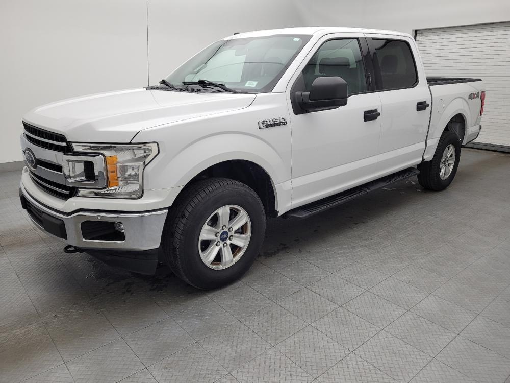 used 2018 Ford F-150 car, priced at $24,395