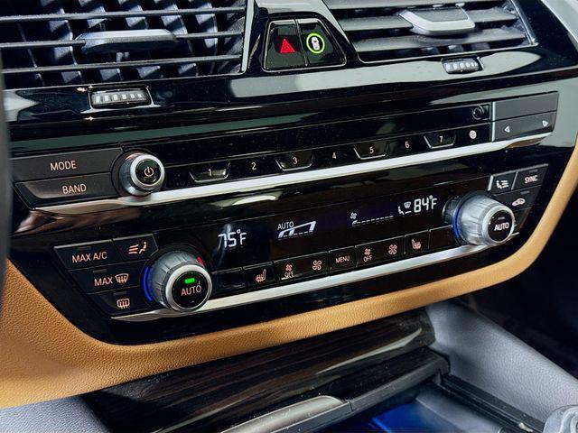 used 2023 BMW 530e car, priced at $32,485