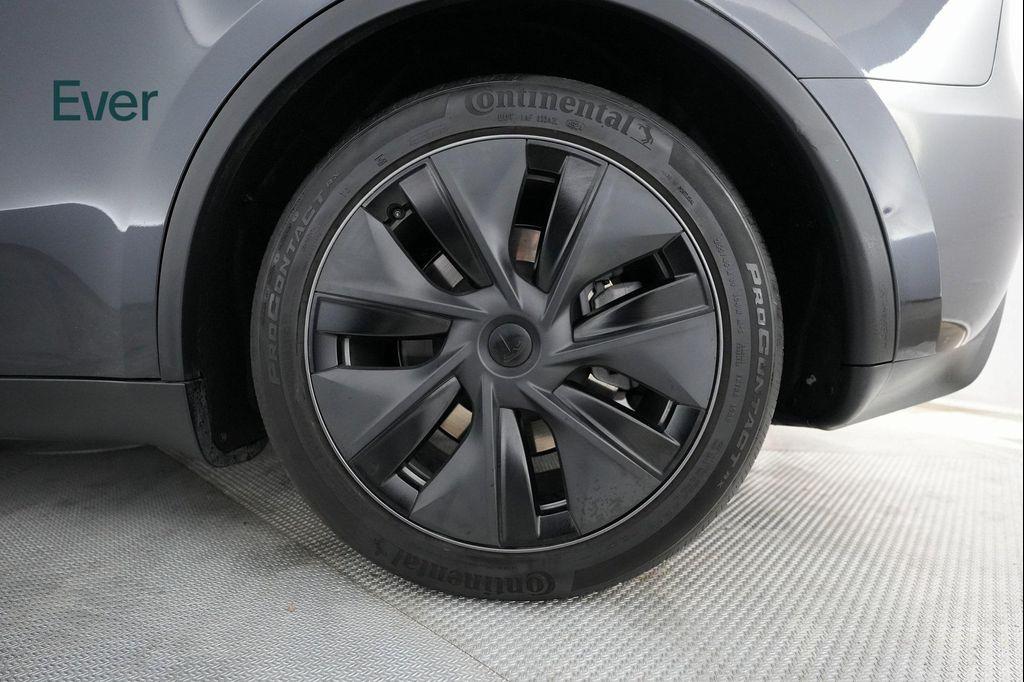 used 2025 Tesla Model Y car, priced at $34,999